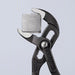 Knipex 87 01 180 Tongue and Groove Plier V, Push Button, 1 1/2 in Max Jaw Opening, 7 1/4 in Overall Lg, Serrated - KVM Tools Inc.KV38GU37